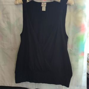 Short top with fitted waist crossover bust with lace inset